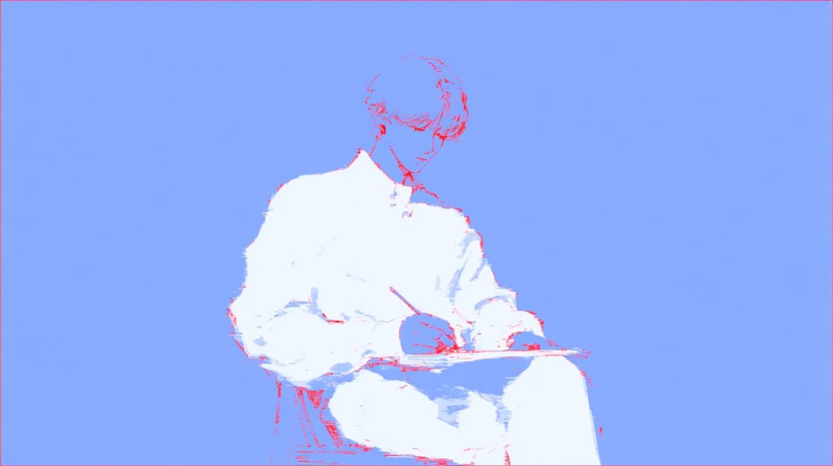 Uma pessoa escrevendo em um caderno