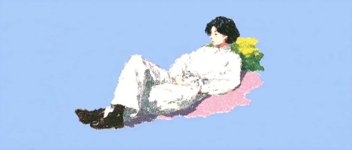 Pessoa descansando confortavelmente, sugerindo relaxamento ou lazer.